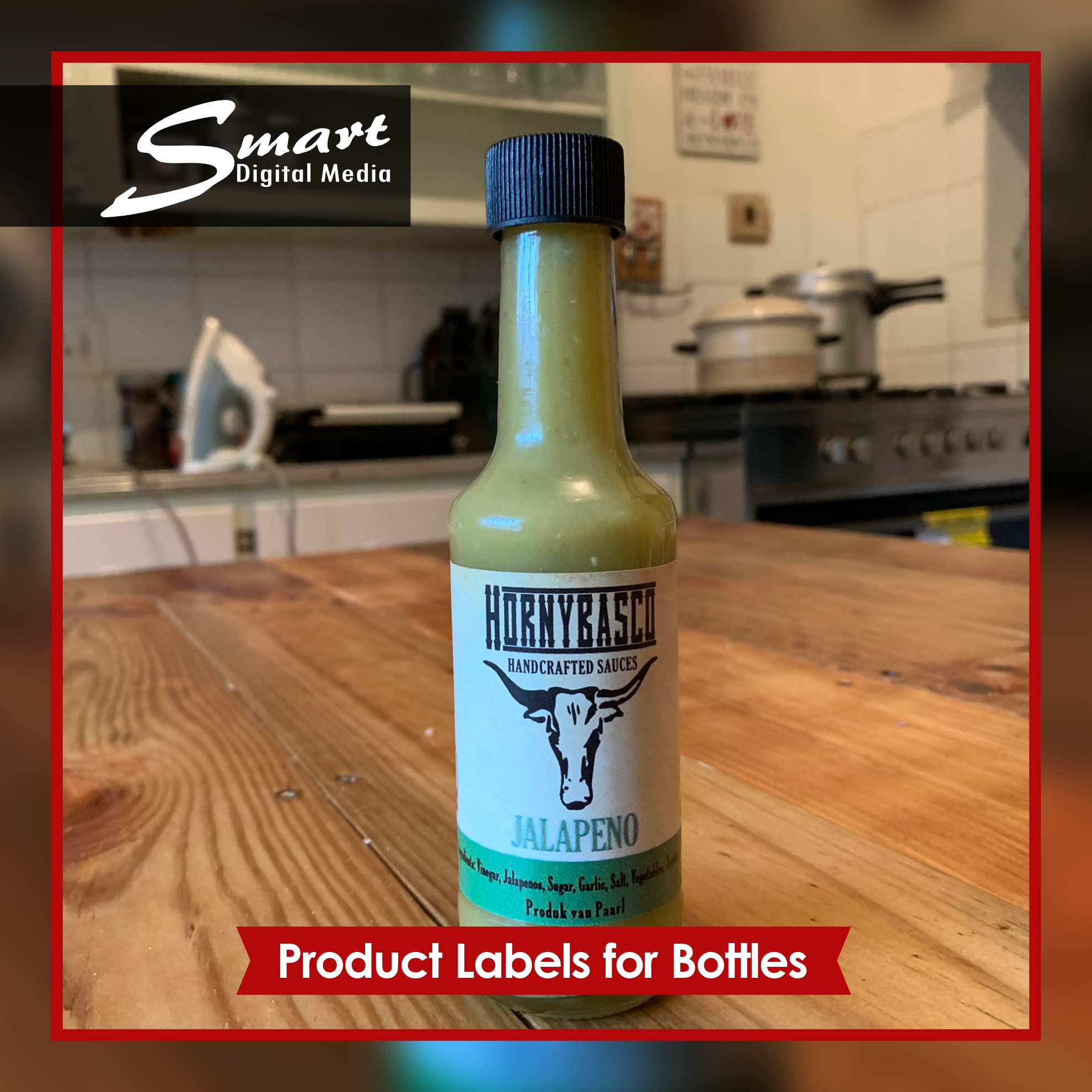 Product Labels for Bottles Bottle of jalepeno sauce standing on kitchen counter top. Labels, Printing & Signage completed by Smart Digital Media's Signage Team, 183 Main Road, Paarl, Cape Winelands, Western Cape, South Africa