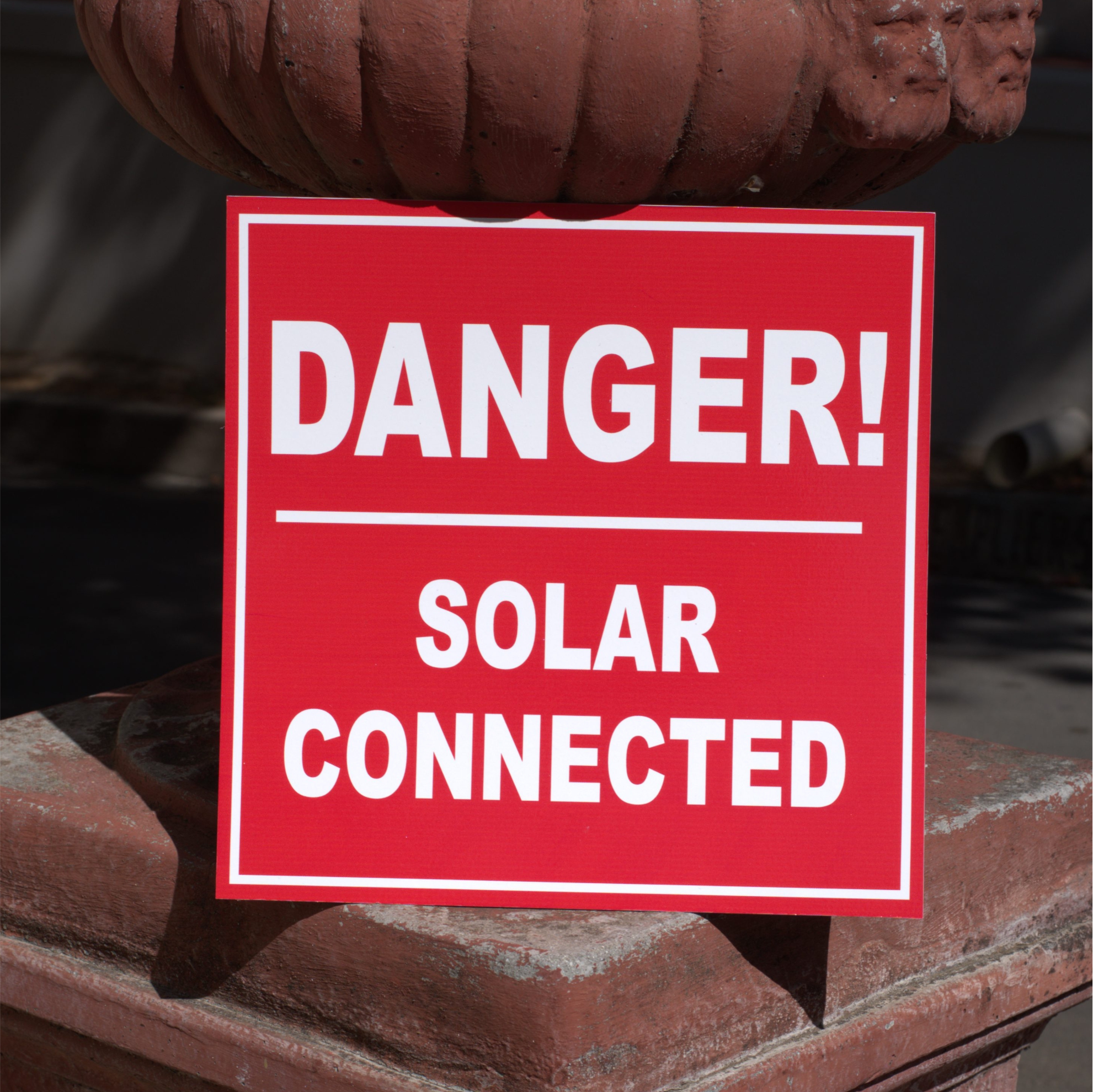 Red background & White Lettering with White Border reads "Danger! Solar Connected" - Safety Signs". We make Custom Designs from Smart Digital Media in Paarl.